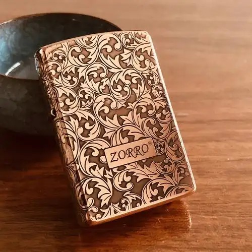 Laser engraving on metal lighter casing